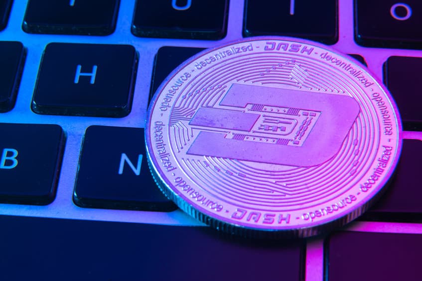 circle dash coin on top of computer keyboard buttons. digital currency, block chain market, online business